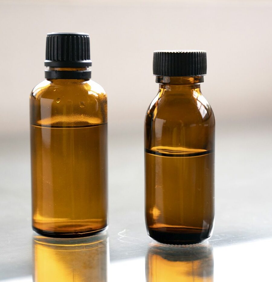 Amber glass bottles of essential oil